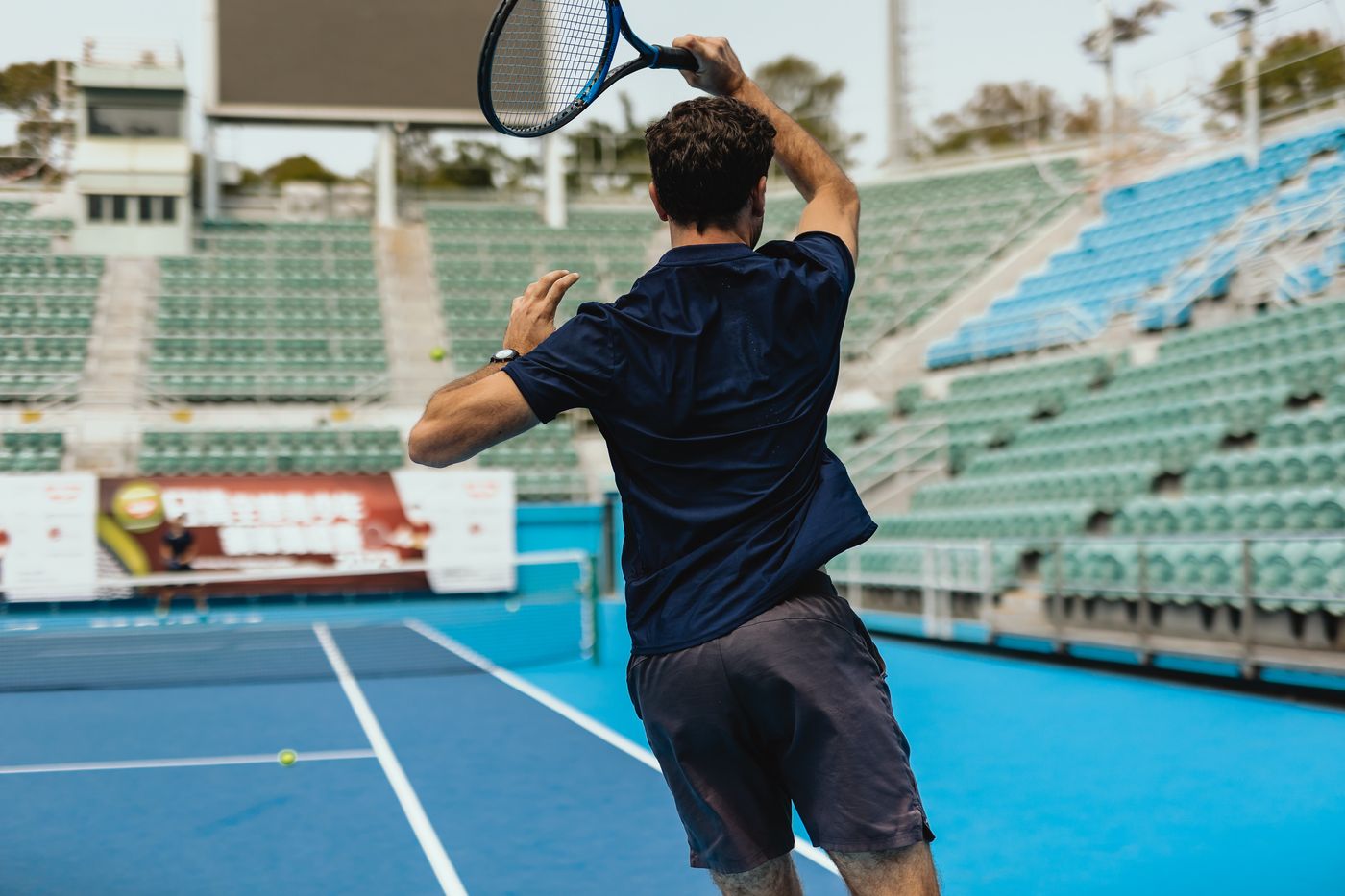 Coach playing on court
